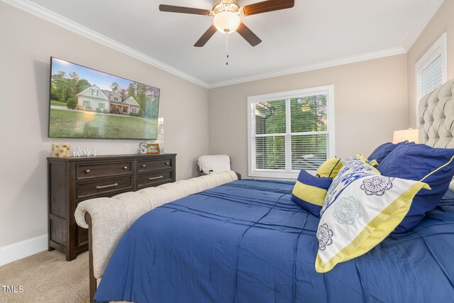 175 Lockamy Ln, Youngsville, NC 27596 - bedroom featuring ornamental molding, multiple windows, light carpet, baseboards, and a ceiling fan