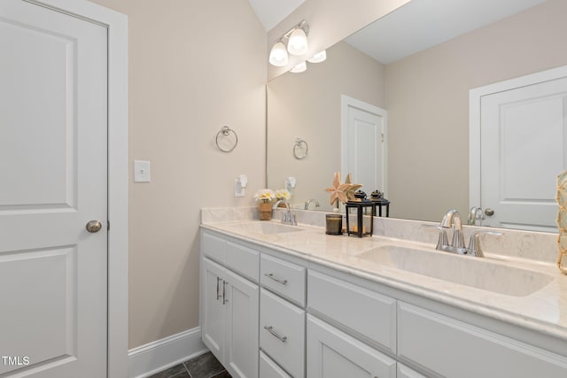 175 Lockamy Ln, Youngsville, NC 27596 - bathroom with baseboards and double vanity