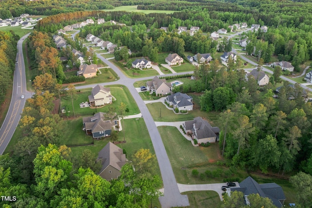 175 Lockamy Ln, Youngsville, NC 27596 - aerial view of property and surrounding area with nearby suburban area and a heavily wooded area