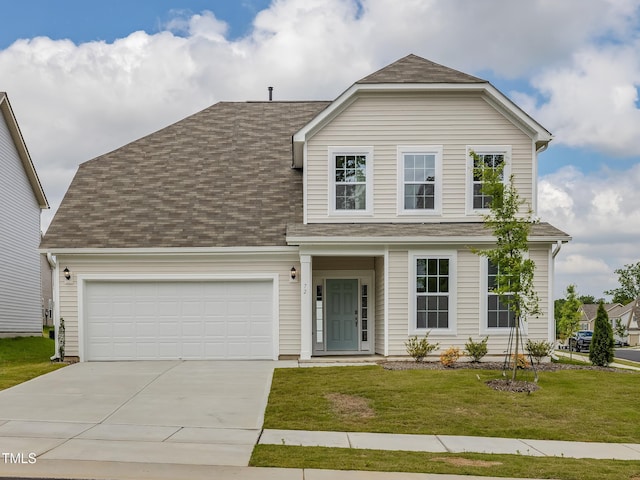 traditional home with concrete driveway, a front lawn, an attached garage, and roof with shingles