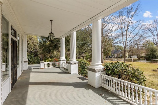 205 N Vance St, Pembroke, NC 28377 - wooden terrace with covered porch