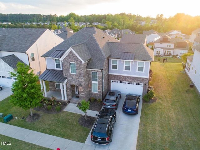 428 Parlier Dr, Apex, NC 27523 - traditional-style home featuring a standing seam roof, concrete driveway, roof with shingles, and a residential view