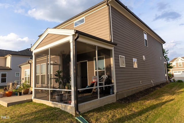 428 Parlier Dr, Apex, NC 27523 - back of property featuring a lawn and a sunroom