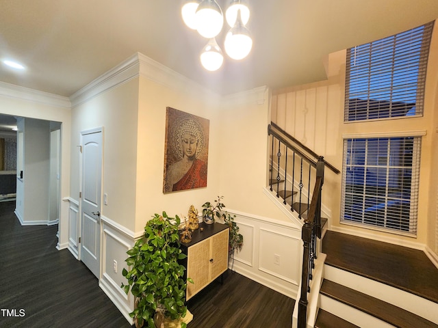 428 Parlier Dr, Apex, NC 27523 - stairs with a decorative wall, a chandelier, a wainscoted wall, wood finished floors, and ornamental molding