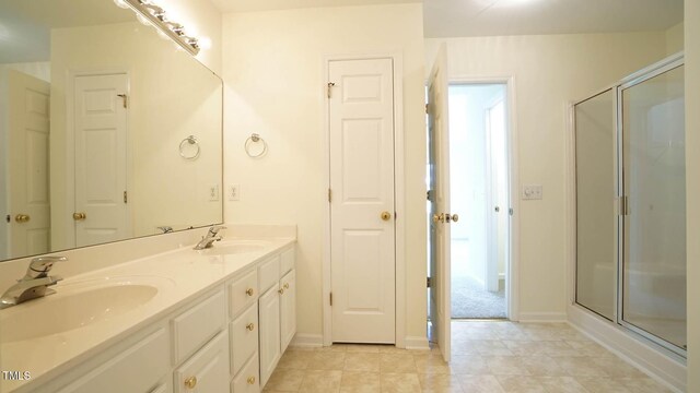 4024 Claret Ln, Morrisville, NC 27560 - full bathroom featuring a sink, a stall shower, and double vanity