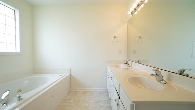 4024 Claret Ln, Morrisville, NC 27560 - full bath with double vanity, a whirlpool tub, baseboards, and a sink
