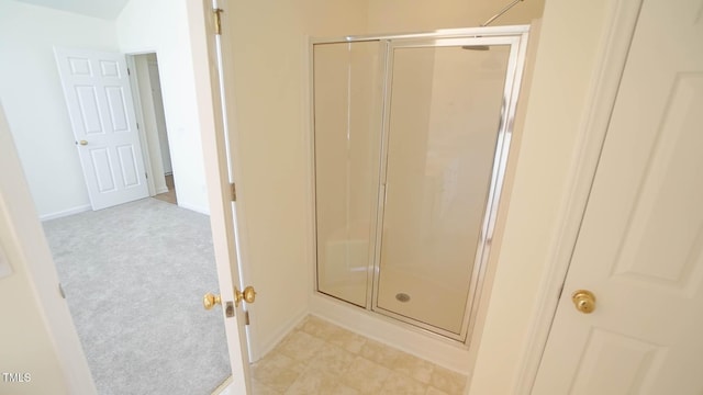 4024 Claret Ln, Morrisville, NC 27560 - bathroom featuring baseboards and a stall shower