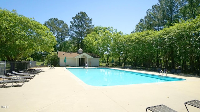 4024 Claret Ln, Morrisville, NC 27560 - pool with a patio and fence