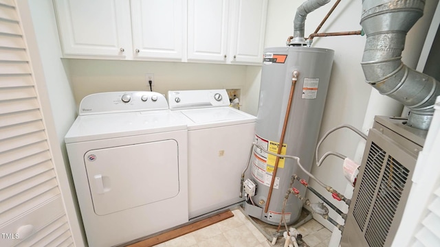 4024 Claret Ln, Morrisville, NC 27560 - clothes washing area featuring washing machine and clothes dryer, cabinet space, and gas water heater