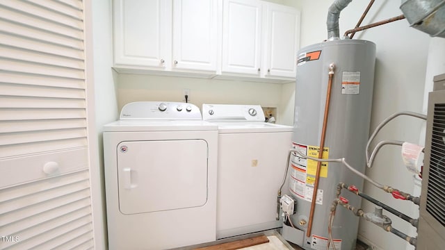 4024 Claret Ln, Morrisville, NC 27560 - washroom featuring cabinet space, washer and clothes dryer, and gas water heater