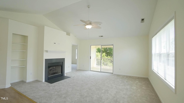 4024 Claret Ln, Morrisville, NC 27560 - unfurnished living room featuring carpet, a ceiling fan, a fireplace with flush hearth, lofted ceiling, and visible vents