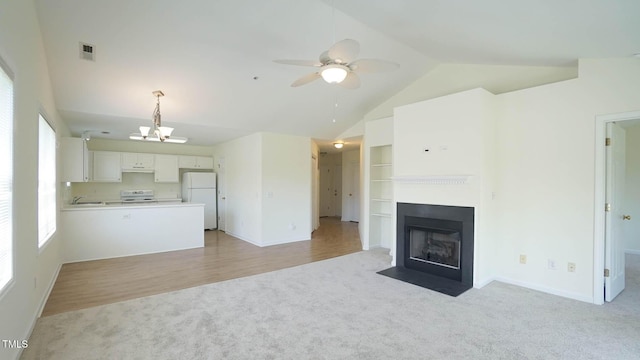 4024 Claret Ln, Morrisville, NC 27560 - unfurnished living room with a ceiling fan, baseboards, visible vents, and light carpet