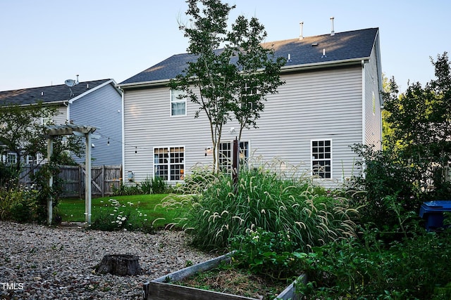 5031 Mckittrick Ln, Durham, NC 27712 - rear view of property with a garden
