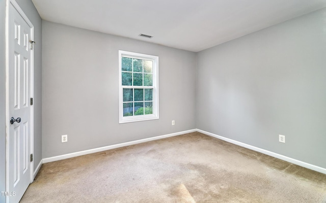 5031 Mckittrick Ln, Durham, NC 27712 - carpeted spare room featuring baseboards