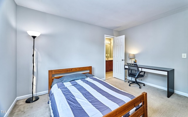5031 Mckittrick Ln, Durham, NC 27712 - bedroom with light carpet and connected bathroom