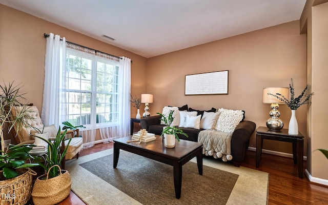 5031 Mckittrick Ln, Durham, NC 27712 - living room with baseboards and wood finished floors