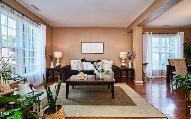 5031 Mckittrick Ln, Durham, NC 27712 - living room featuring wood finished floors and baseboards
