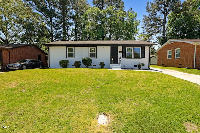 2311 Wintergreen Pl, Durham, NC 27707 - single story home featuring concrete driveway, a front yard, and crawl space