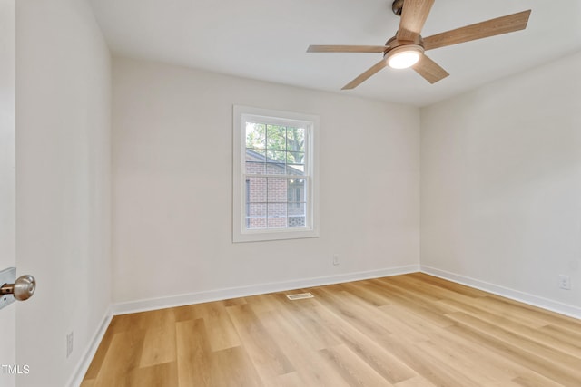 2311 Wintergreen Pl, Durham, NC 27707 - unfurnished room featuring light wood-style floors, baseboards, ceiling fan, and visible vents
