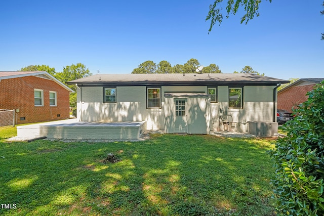 2311 Wintergreen Pl, Durham, NC 27707 - back of house with a lawn and central AC unit