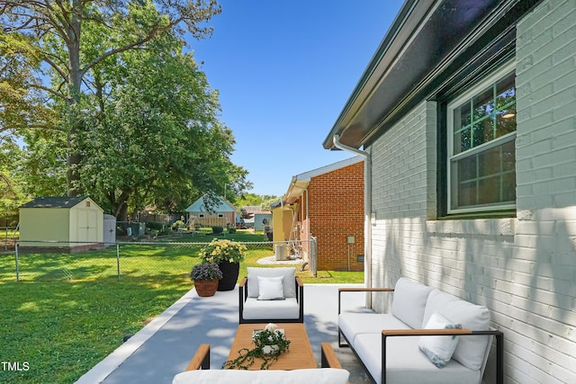 2311 Wintergreen Pl, Durham, NC 27707 - view of patio featuring fence, a storage unit, an outbuilding, and an outdoor living space