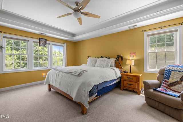 1420 Norwood Crest Ct, Raleigh, NC 27614 - carpeted bedroom featuring baseboards, a tray ceiling, and a ceiling fan
