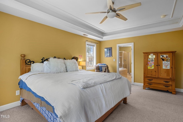 1420 Norwood Crest Ct, Raleigh, NC 27614 - carpeted bedroom with a tray ceiling, ornamental molding, baseboards, a ceiling fan, and ensuite bath