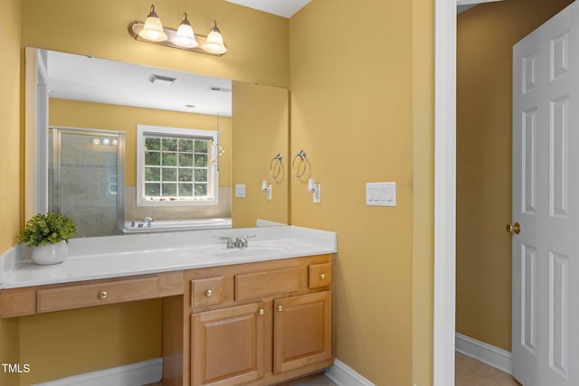 1420 Norwood Crest Ct, Raleigh, NC 27614 - bathroom featuring vanity, a stall shower, tile patterned floors, and baseboards