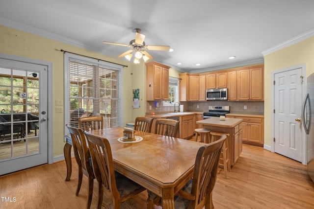 1420 Norwood Crest Ct, Raleigh, NC 27614 - dining room with crown molding, light wood-type flooring, ceiling fan, healthy amount of natural light, and recessed lighting