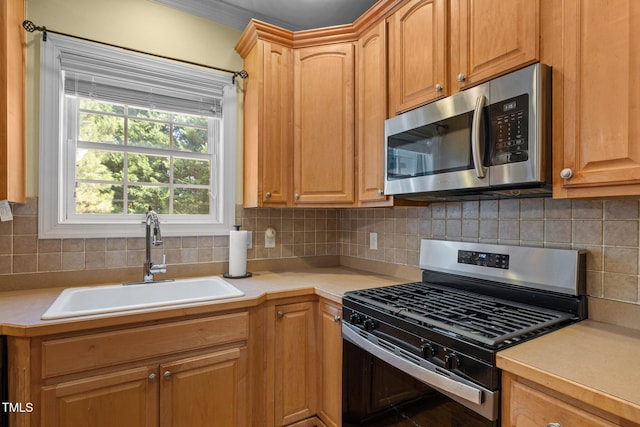 1420 Norwood Crest Ct, Raleigh, NC 27614 - kitchen with stainless steel appliances, a sink, light countertops, and tasteful backsplash