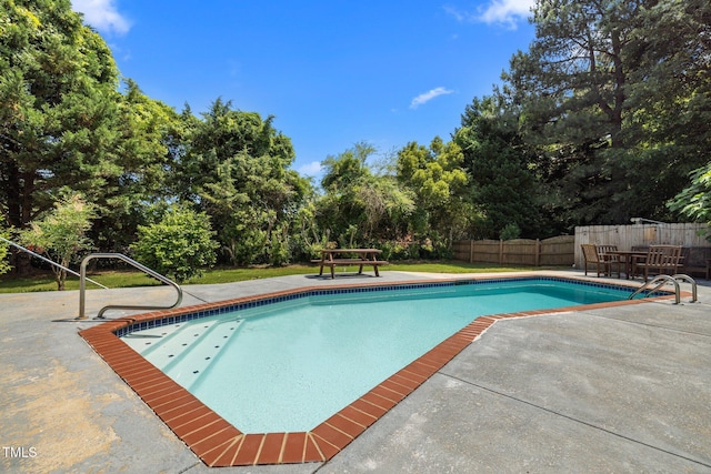1420 Norwood Crest Ct, Raleigh, NC 27614 - view of pool featuring a patio and view of wooded area