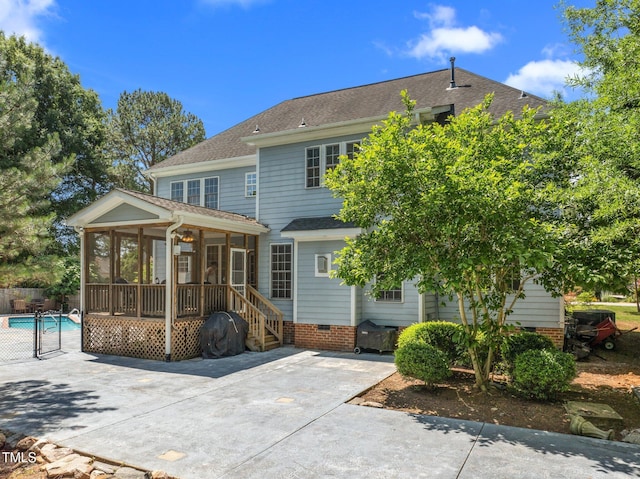 1420 Norwood Crest Ct, Raleigh, NC 27614 - back of property with a sunroom, a patio, roof with shingles, and crawl space