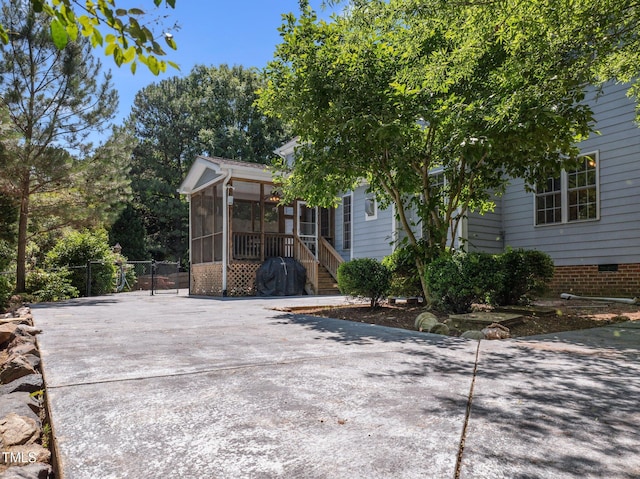 1420 Norwood Crest Ct, Raleigh, NC 27614 - back of property with a sunroom, driveway, and crawl space