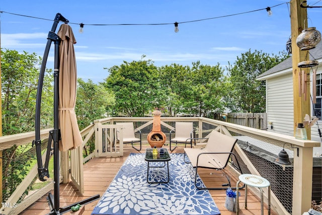 deck featuring fence