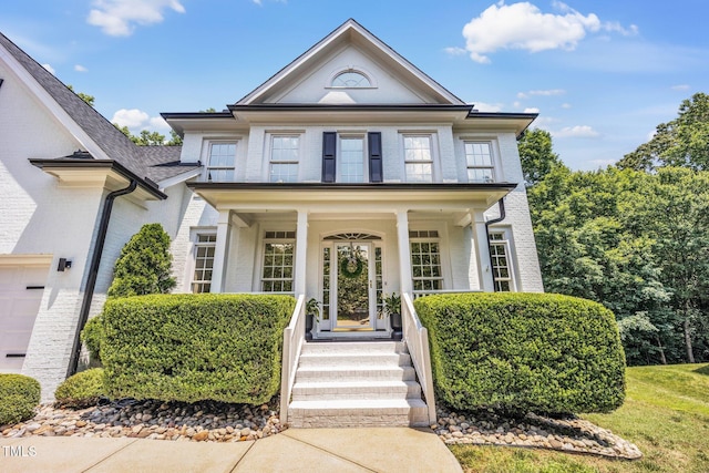1001 Dairy House Ct, Wake Forest, NC 27587 - view of front facade with a porch and brick siding