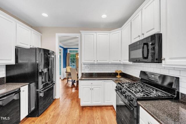 1001 Dairy House Ct, Wake Forest, NC 27587 - kitchen featuring black appliances, light wood-style flooring, white cabinetry, decorative backsplash, and recessed lighting