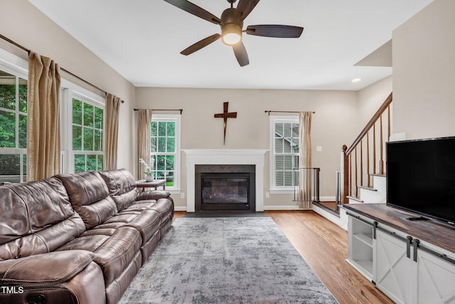 1001 Dairy House Ct, Wake Forest, NC 27587 - living room featuring ceiling fan, light wood-style floors, stairway, a fireplace with flush hearth, and recessed lighting