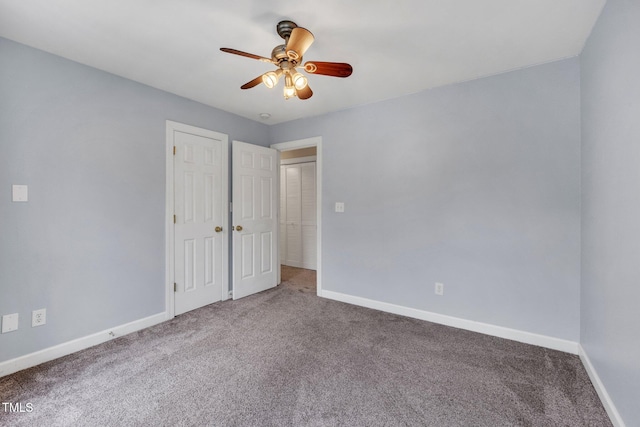 1001 Dairy House Ct, Wake Forest, NC 27587 - unfurnished bedroom featuring carpet floors, baseboards, ceiling fan, and a closet
