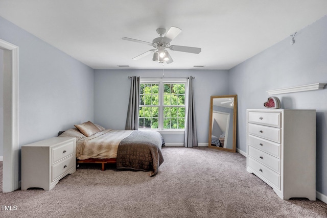 1001 Dairy House Ct, Wake Forest, NC 27587 - bedroom with light colored carpet, a ceiling fan, and baseboards