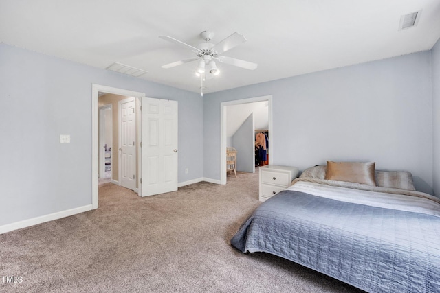 1001 Dairy House Ct, Wake Forest, NC 27587 - bedroom with carpet flooring, baseboards, a ceiling fan, and a walk in closet