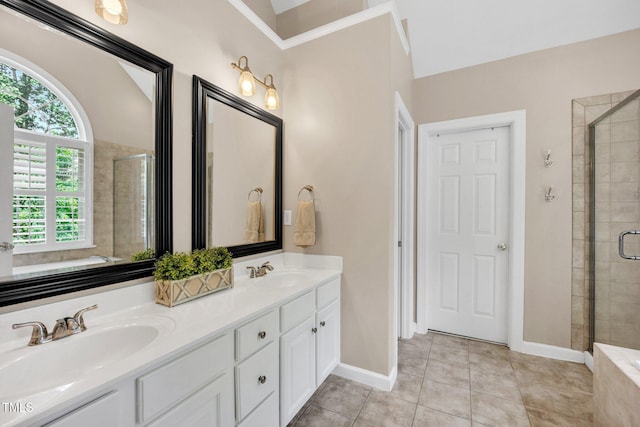 1001 Dairy House Ct, Wake Forest, NC 27587 - bathroom with a shower stall, double vanity, tile patterned flooring, and baseboards