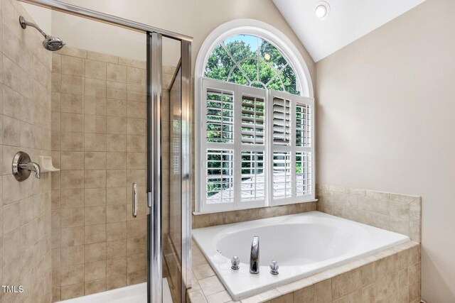 1001 Dairy House Ct, Wake Forest, NC 27587 - bathroom featuring vaulted ceiling, a garden tub, a stall shower, and recessed lighting