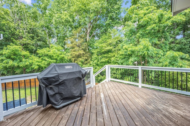 1001 Dairy House Ct, Wake Forest, NC 27587 - wooden terrace with a grill and a fenced backyard