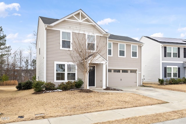 1012 Old Evergreen Dr, Durham, NC 27704 - view of front of property with an attached garage and concrete driveway