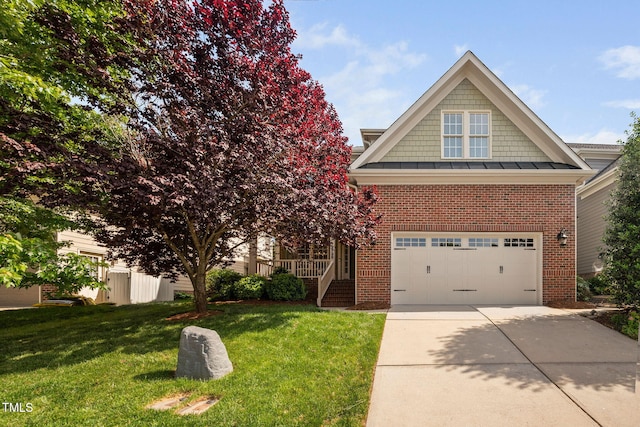 view of front of property featuring brick siding, driveway, a front yard, and a garage