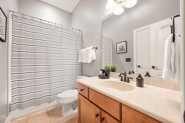 2728 Cameron Pond Dr, Cary, NC 27519 - bathroom with tile patterned floors, toilet, vanity, and shower / bath combination with curtain