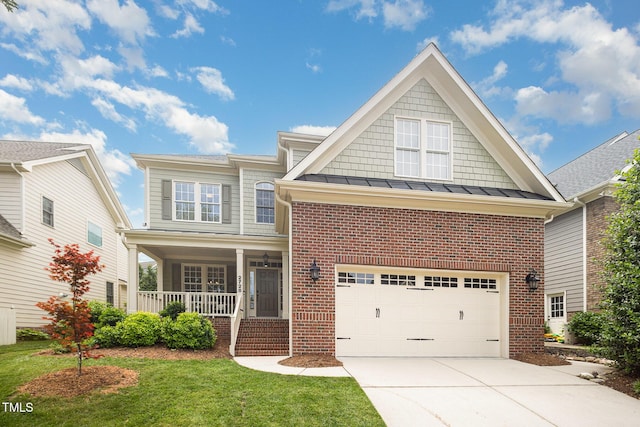 2728 Cameron Pond Dr, Cary, NC 27519 - view of front of home with brick siding, covered porch, a garage, concrete driveway, and a standing seam roof