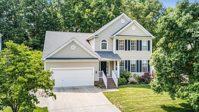 437 New Parkside Dr, Chapel Hill, NC 27516 - traditional home with driveway, a shingled roof, a front yard, and a garage