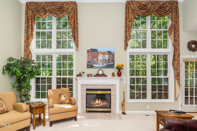 437 New Parkside Dr, Chapel Hill, NC 27516 - living area featuring visible vents, a high ceiling, a wealth of natural light, and a fireplace