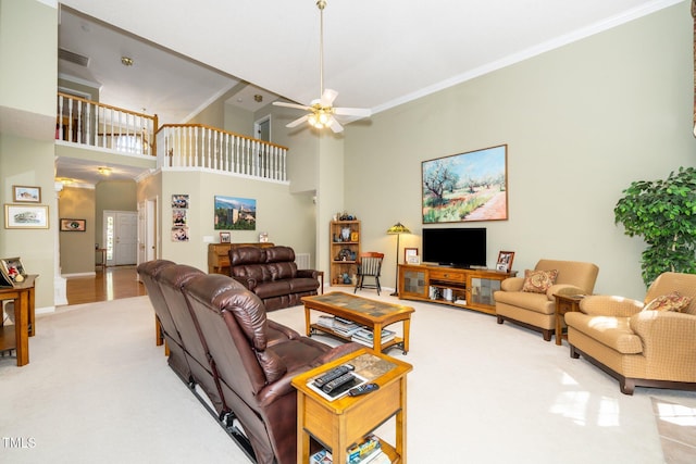 437 New Parkside Dr, Chapel Hill, NC 27516 - living room featuring crown molding, baseboards, ceiling fan, a high ceiling, and light colored carpet